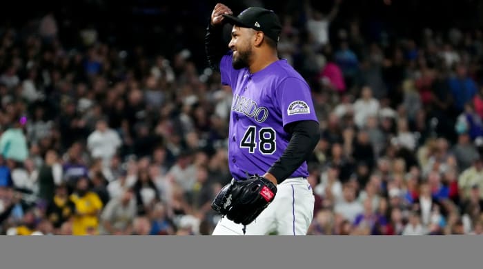 Jun 29, 2021; Denver, Colorado, USA; Colorado Rockies starting pitcher German Marquez (48) celebrates defeating the Pittsburgh Pirates at Coors Field.
